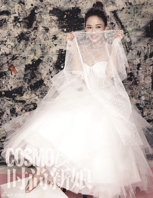 
	
	Trần Kiều Ân e ấp bên váy cưới trên tạp chí Cosmopolitan